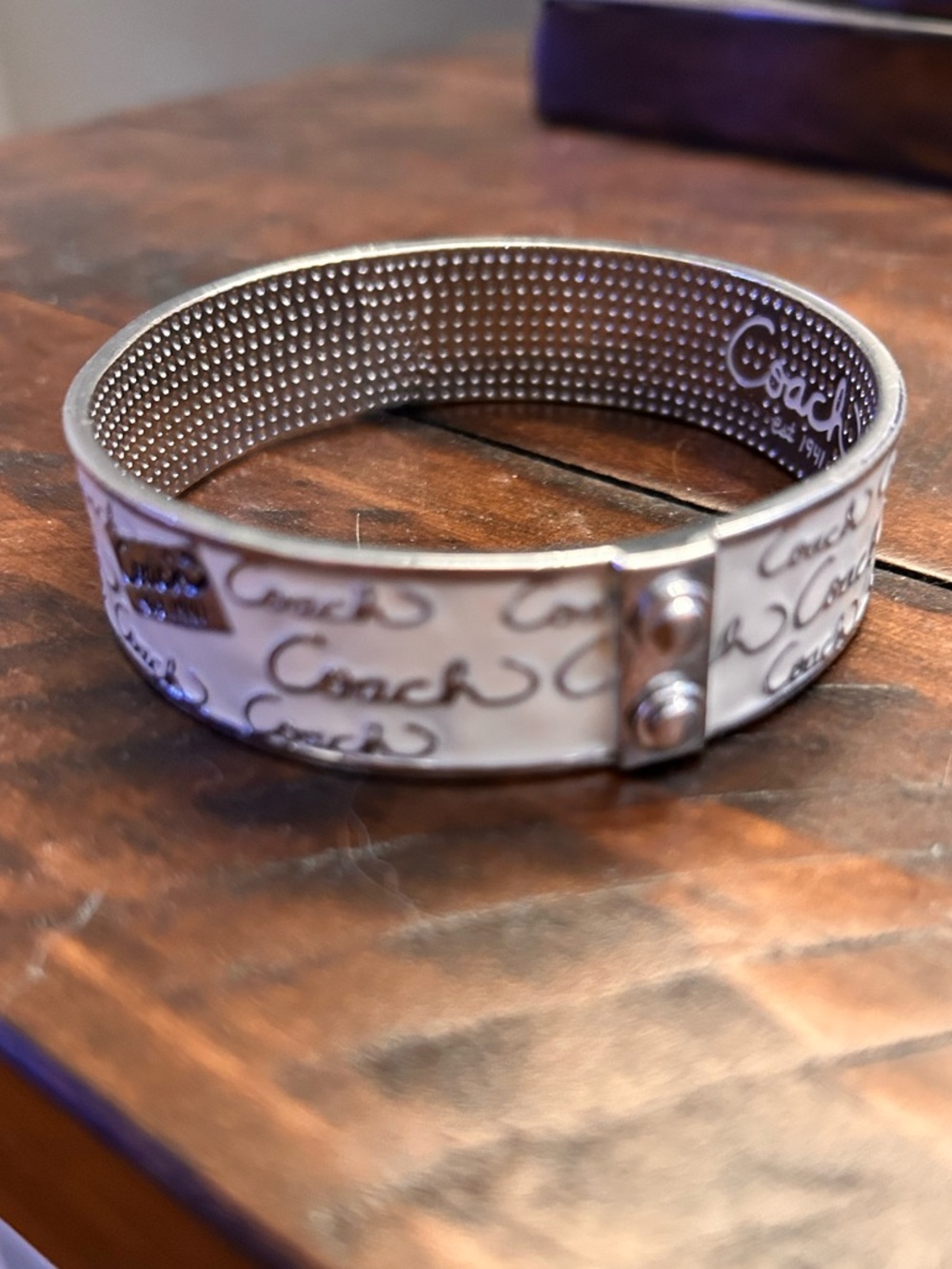 Coach Silver-Tone Signature Script Hinged Bangle - Picture 2 of 7